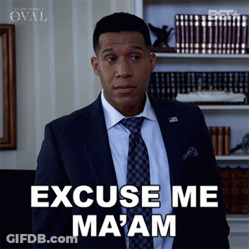 A Man In A Suit And Tie Says " Excuse Me Ma 'Am " GIF