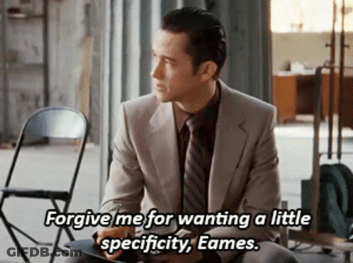 A Man In A Suit And Tie Says Forgive Me For Wanting A Little Specificity GIF
