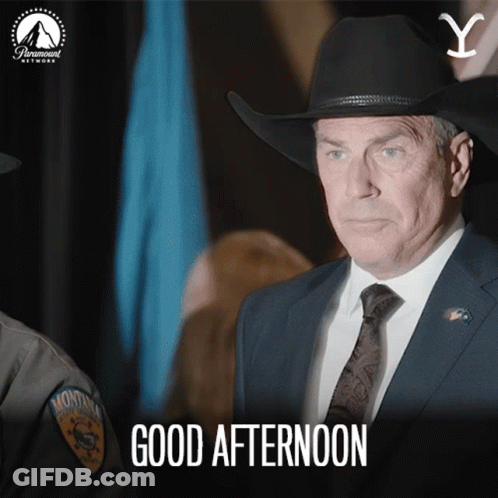 A Man In A Suit And Tie Says Good Afternoon In A Paramount Network Ad GIF