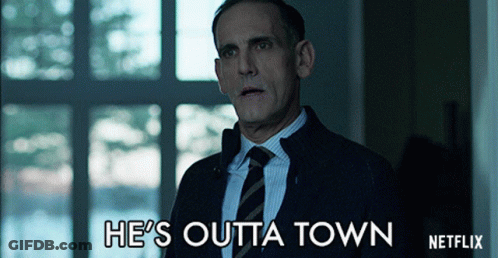A Man In A Suit And Tie Says He 'S Outta Town On Netflix GIF