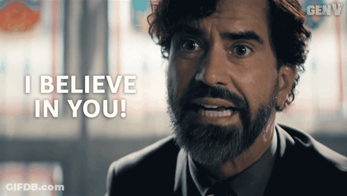 A Man In A Suit And Tie Says I Believe In You GIF