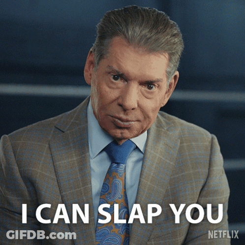 A Man In A Suit And Tie Says I Can Slap You On A Netflix Screen GIF
