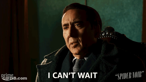 A Man In A Suit And Tie Says " I Can 'T Wait " While Sitting In A Chair GIF