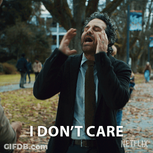 A Man In A Suit And Tie Says I Do N't Care Netflix GIF