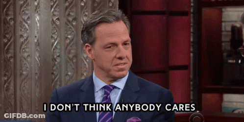 A Man In A Suit And Tie Says " I Don T Think Anybody Cares " GIF