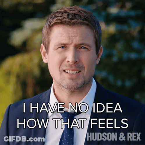 A Man In A Suit And Tie Says " I Have No Idea How That Feels Hudson & Rex " GIF