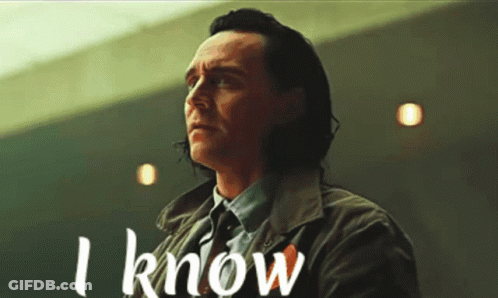 A Man In A Suit And Tie Says " I Know " In White Letters GIF