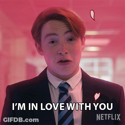 A Man In A Suit And Tie Says I 'M In Love With You Netflix GIF