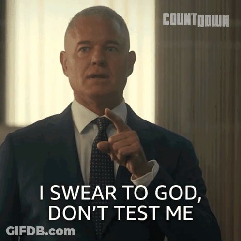 A Man In A Suit And Tie Says I Swear To God Don T Test Me GIF