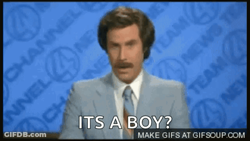 A Man In A Suit And Tie Says It Is A Boy GIF