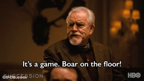 A Man In A Suit And Tie Says It 'S A Game Boar On The Floor GIF