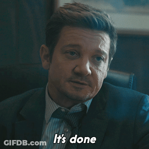 A Man In A Suit And Tie Says " It 'S Done " While Sitting In A Chair GIF