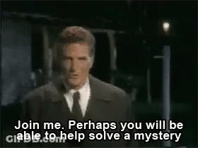 A Man In A Suit And Tie Says Join Me Perhaps You Will Be Able To Solve A Mystery GIF