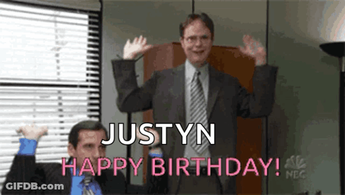 A Man In A Suit And Tie Says Justyn Happy Birthday To Another Man GIF