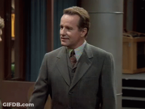 A Man In A Suit And Tie Says " Maybe " And " Or Maybe I Just Like Canes " GIF