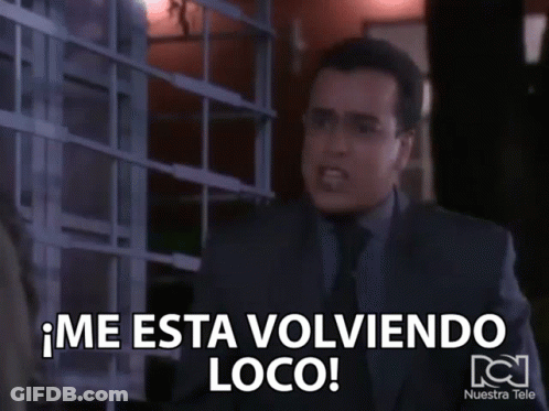A Man In A Suit And Tie Says Me Esta Volviendo Loco GIF