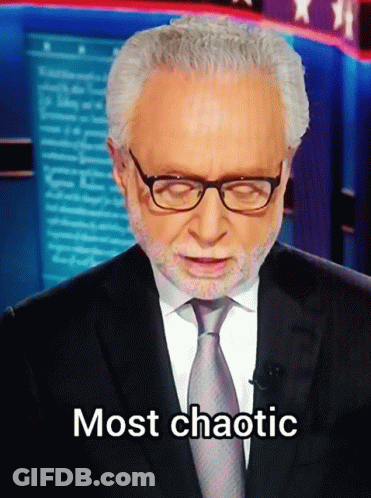 A Man In A Suit And Tie Says Most Chaotic On The Screen GIF