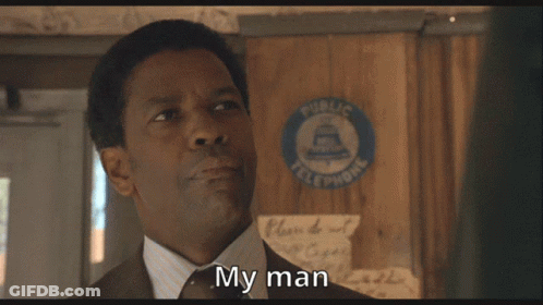 A Man In A Suit And Tie Says My Man GIF
