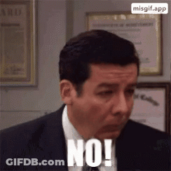 A Man In A Suit And Tie Says No . GIF