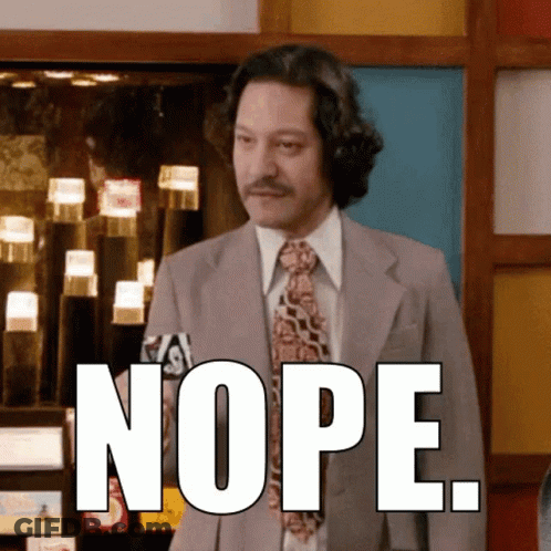 A Man In A Suit And Tie Says Nope In Front Of A Display Case GIF