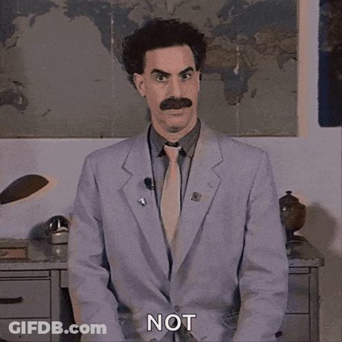 A Man In A Suit And Tie Says Not In Front Of A Map Of The World GIF