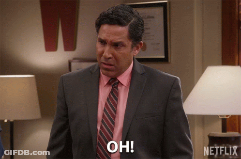 A Man In A Suit And Tie Says Oh In A Netflix Ad GIF