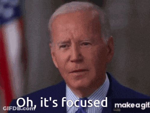 A Man In A Suit And Tie Says Oh It 'S Focused Make A GIF
