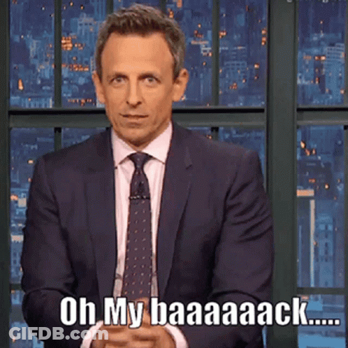 A Man In A Suit And Tie Says Oh My Baaaack GIF