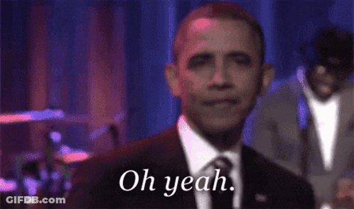 A Man In A Suit And Tie Says " Oh Yeah " GIF