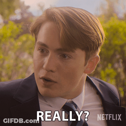 A Man In A Suit And Tie Says Really On A Netflix Ad GIF