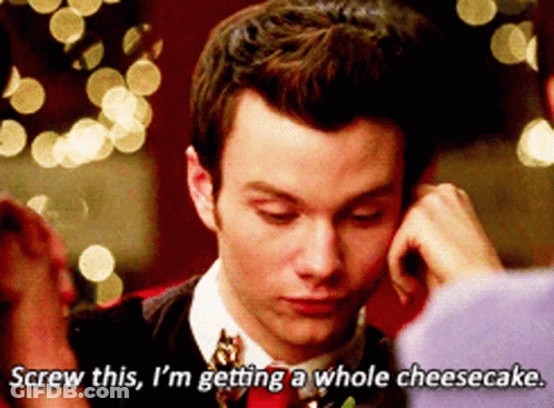 A Man In A Suit And Tie Says " Screw This I 'M Getting A Whole Cheesecake " GIF