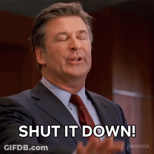 A Man In A Suit And Tie Says Shut It Down With His Eyes Closed GIF