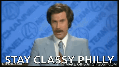 A Man In A Suit And Tie Says " Stay Classy Philly " On A Screen GIF