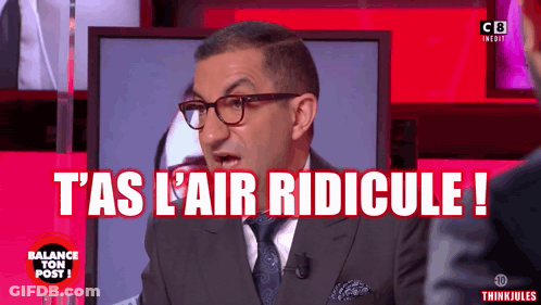A Man In A Suit And Tie Says " T As L' Air Ridicule " GIF