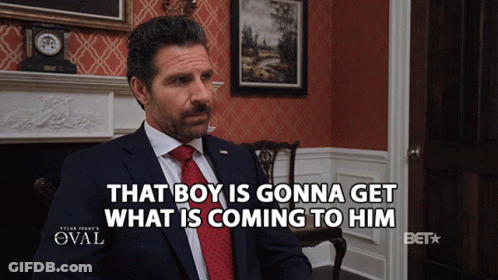 A Man In A Suit And Tie Says That Boy Is Gonna Get What 'S Coming To Him GIF