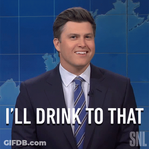 A Man In A Suit And Tie Says That He 'Ll Drink To That GIF
