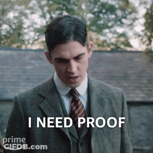 A Man In A Suit And Tie Says That He Needs Proof GIF
