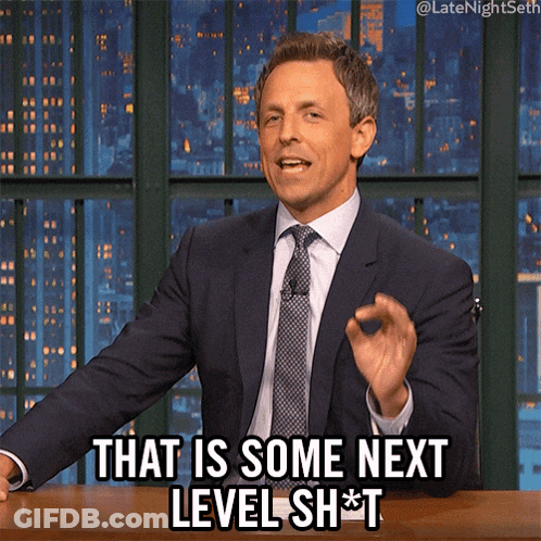A Man In A Suit And Tie Says That Is Some Next Level Sh*t GIF