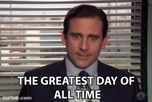 Man In Suit And Tie Says The Greatest Day Of All Time GIF