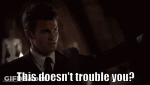 A Man In A Suit And Tie Says This Doesn 'T Trouble You GIF