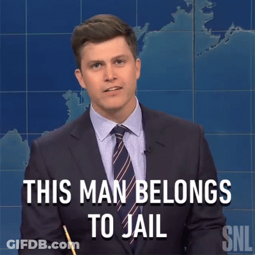 A Man In A Suit And Tie Says This Man Belongs To Jail While Holding A Pencil GIF