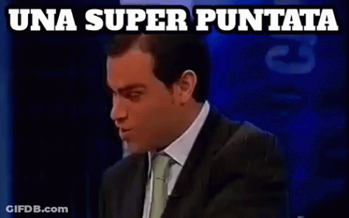 A Man In A Suit And Tie Says Una Super Puntata On A Blue Background GIF