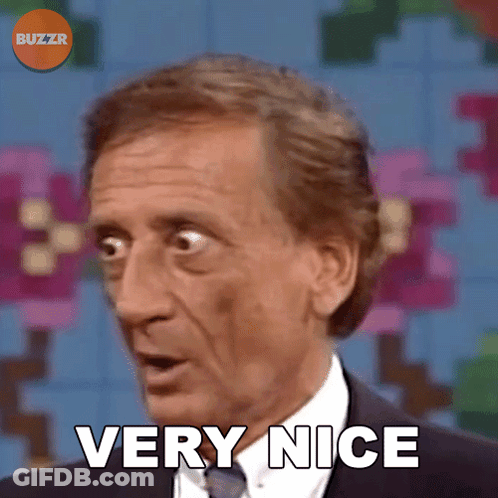 A Man In A Suit And Tie Says Very Nice In Front Of A Buzzr Logo GIF