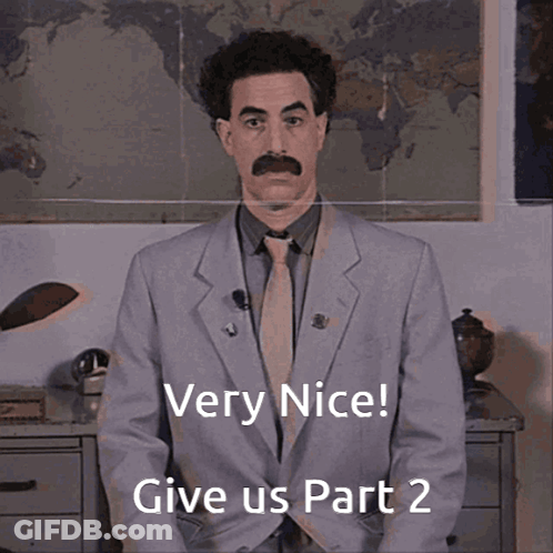 A Man In A Suit And Tie Says " Very Nice " GIF