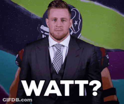 A Man In A Suit And Tie Says Watt In Front Of A Football Player In A Helmet GIF