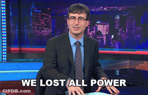 A Man In A Suit And Tie Says " We Lost All Power " On A Stage GIF