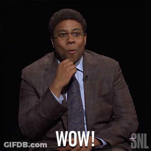 A Man In A Suit And Tie Says Wow In A Snl Ad GIF