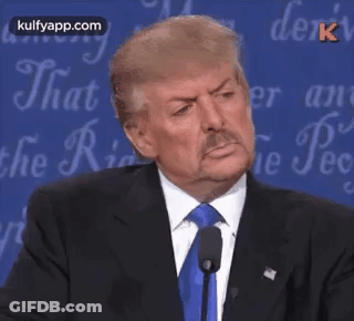 A Man In A Suit And Tie Says Wrong In Front Of A Blue Background GIF