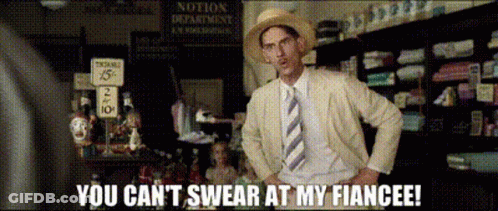 A Man In A Suit And Tie Says " You Can 'T Swear At My Fiancee ! " GIF