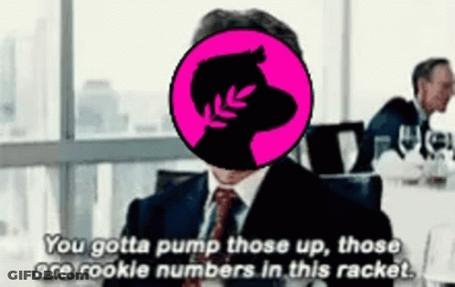 A Man In A Suit And Tie Says You Gotta Pump Those Up Those Are Rookle Numbers In This Racket GIF